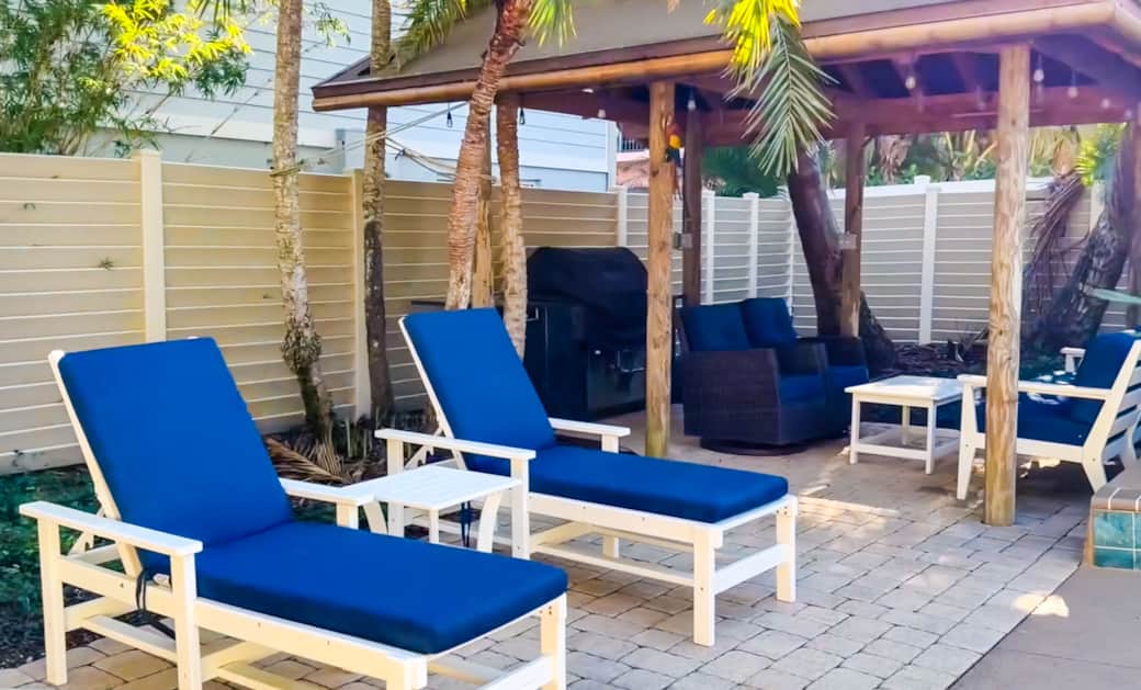 Private tropical pool and covered tiki bar