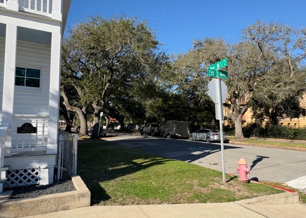 Corner view of White Magnolia Galveston at Moody Avenue and M 1/2 Street