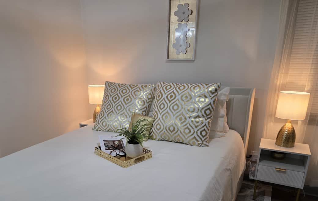 Relax and recharge in this cozy queen bed at Braves Battery Central in Smyrna, Ga