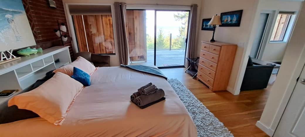 Bedroom with a view and access to the private deck.