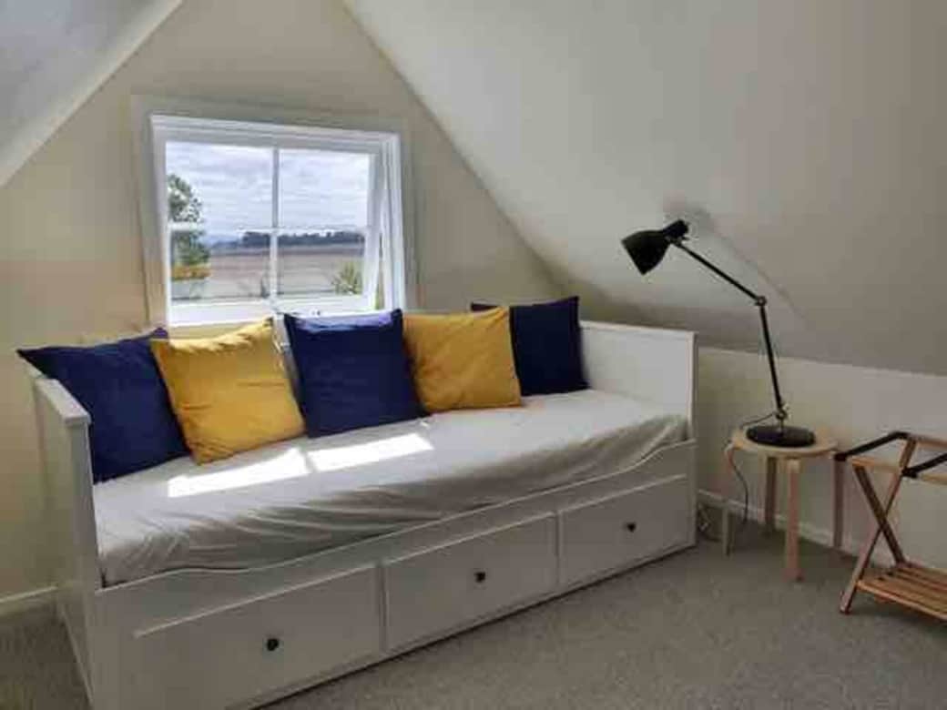 Day bed in attic- can convert to a queen bed