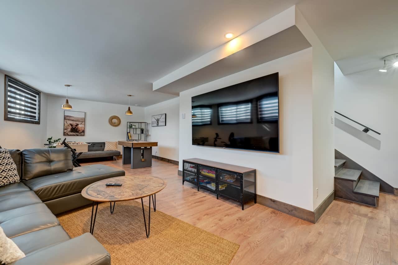 Family room with 86 TV - basement
