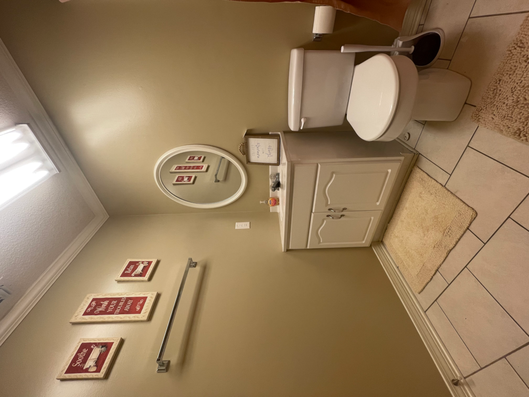 Main bathroom.  If it's sideways in the picture, don't worry it's not sideways in real life.
