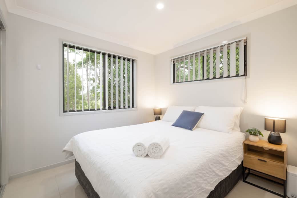 Bedroom 1: Peaceful bedroom with cozy design and ample storage