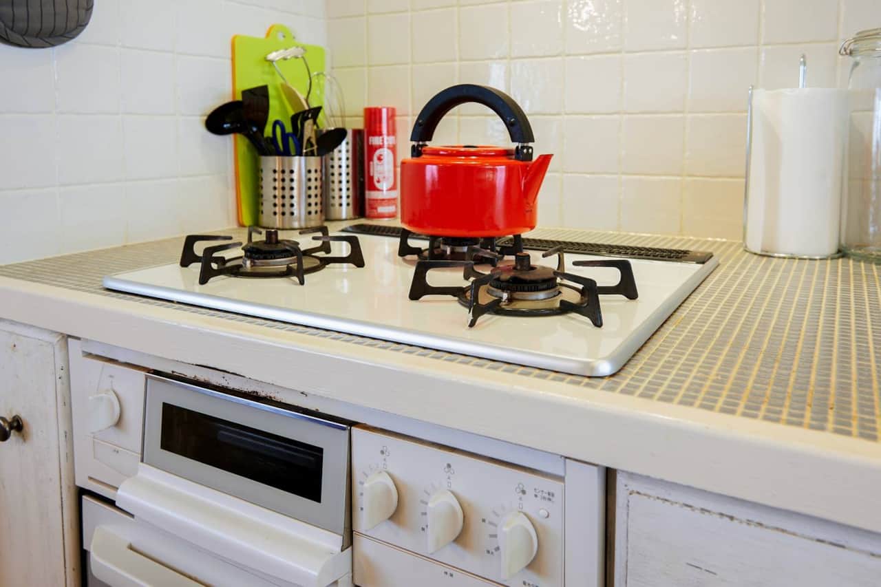 Whip up hearty meals with a vintage-style gas stove, complete with a kettle and all your essentials