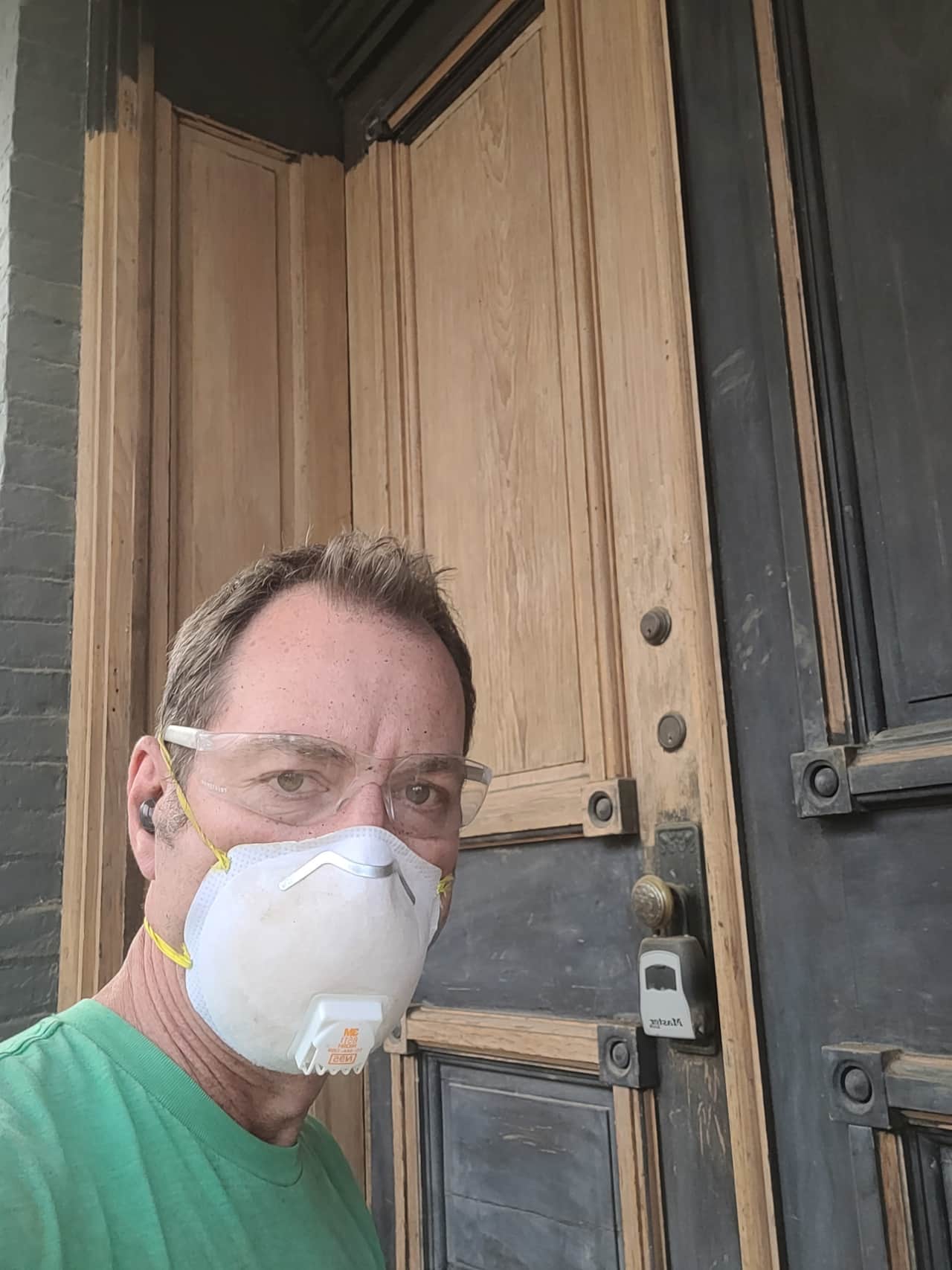 Sanding down the front doors