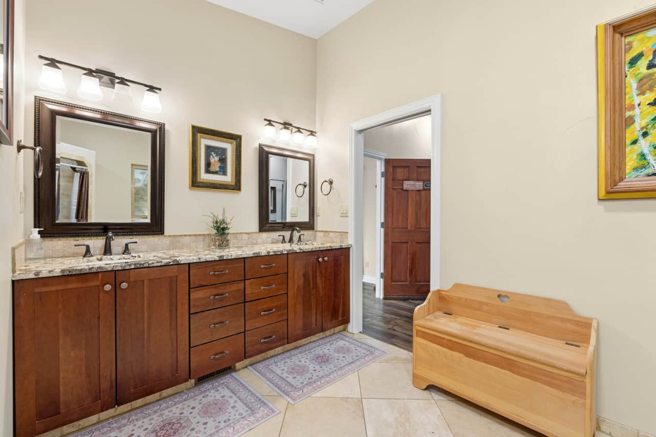 Double vanity in travertine with generous storage