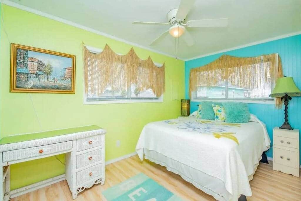 2nd bedroom with queen bed, desk, and chair