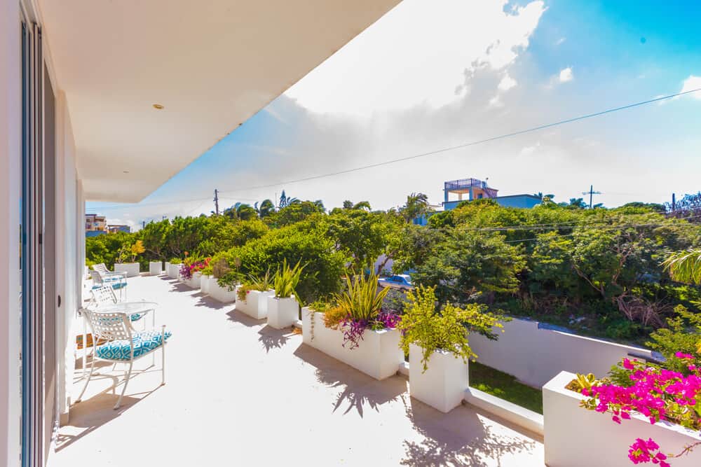 Vacation Rental Isla Mujeres-Taste of Isla-Casa Luna Loca-Punta Sur- 1st floor terrace, chairs in fr Vacation Rental Isla Mujeres-Taste of Isla-Casa Luna Loca-Punta Sur- 1st floor terrace, chairs in fr