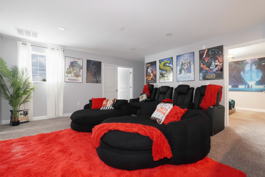 Entertainment Lounge: Unwind in this vibrant space with plush seating and your favorite movie poster