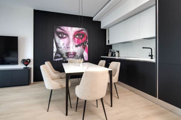Evening dining at Olbia old town square with The Wine Club and outdoor terraces — photo by RENTAL12