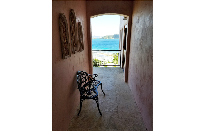 The private entry gate leads to the breezeway