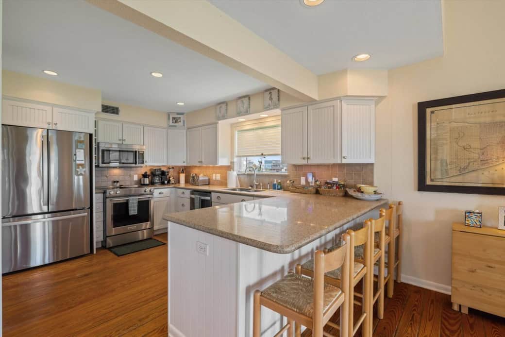 Additional seating at kitchen bar.