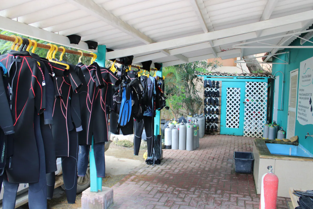 You can leave rental equipment in storage cubicles. No need to carry them up