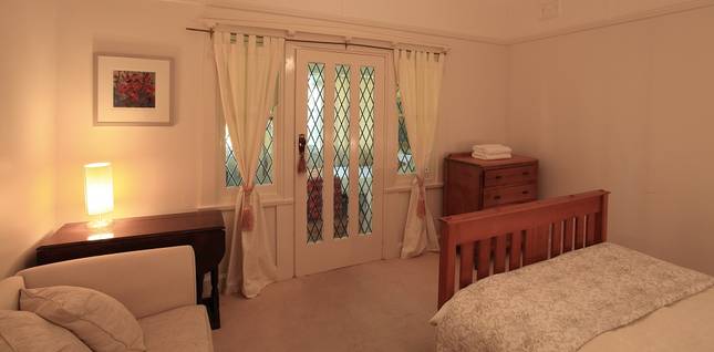 Queen Bedroom with Access to Sunroom