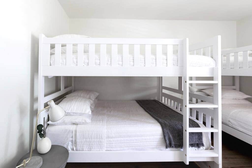Bunkroom with full over full and twin over twin bunk beds.