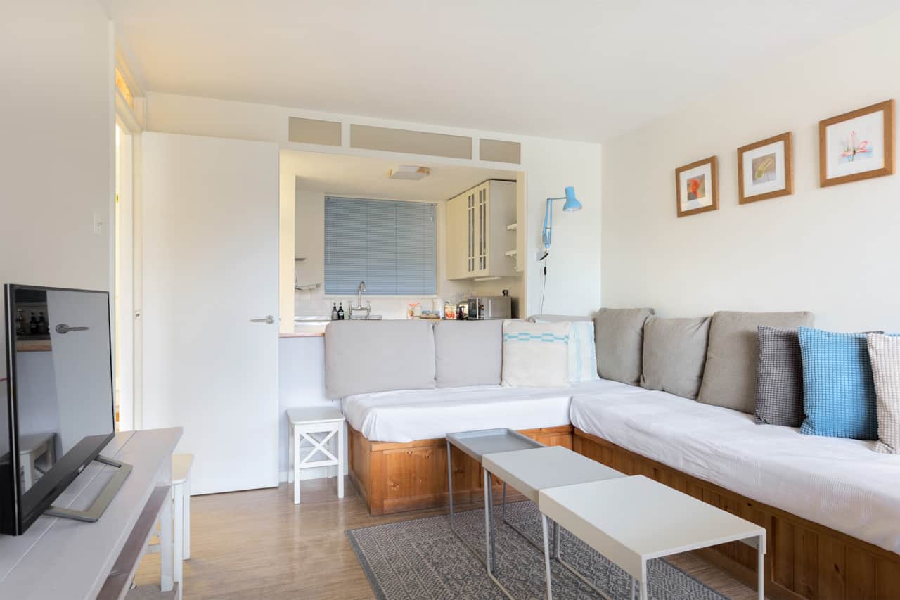 Open sightline into the kitchen from the corner sofa