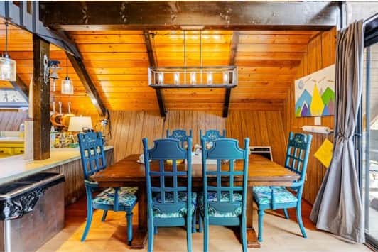 Dining table seats six with a high chair available. Dining table seats six with a high chair available.