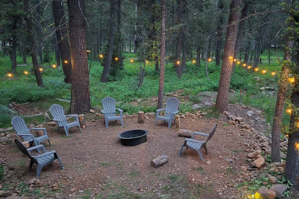 Soak up the sounds and smells of the forest as you sit around the campfire. Roast a hot dog or experiment with different s'mores combinations as you enjoy the fire and string-lit area.