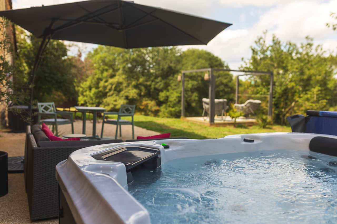 Private outdoor jacuzzi overlooking the peaceful gardens