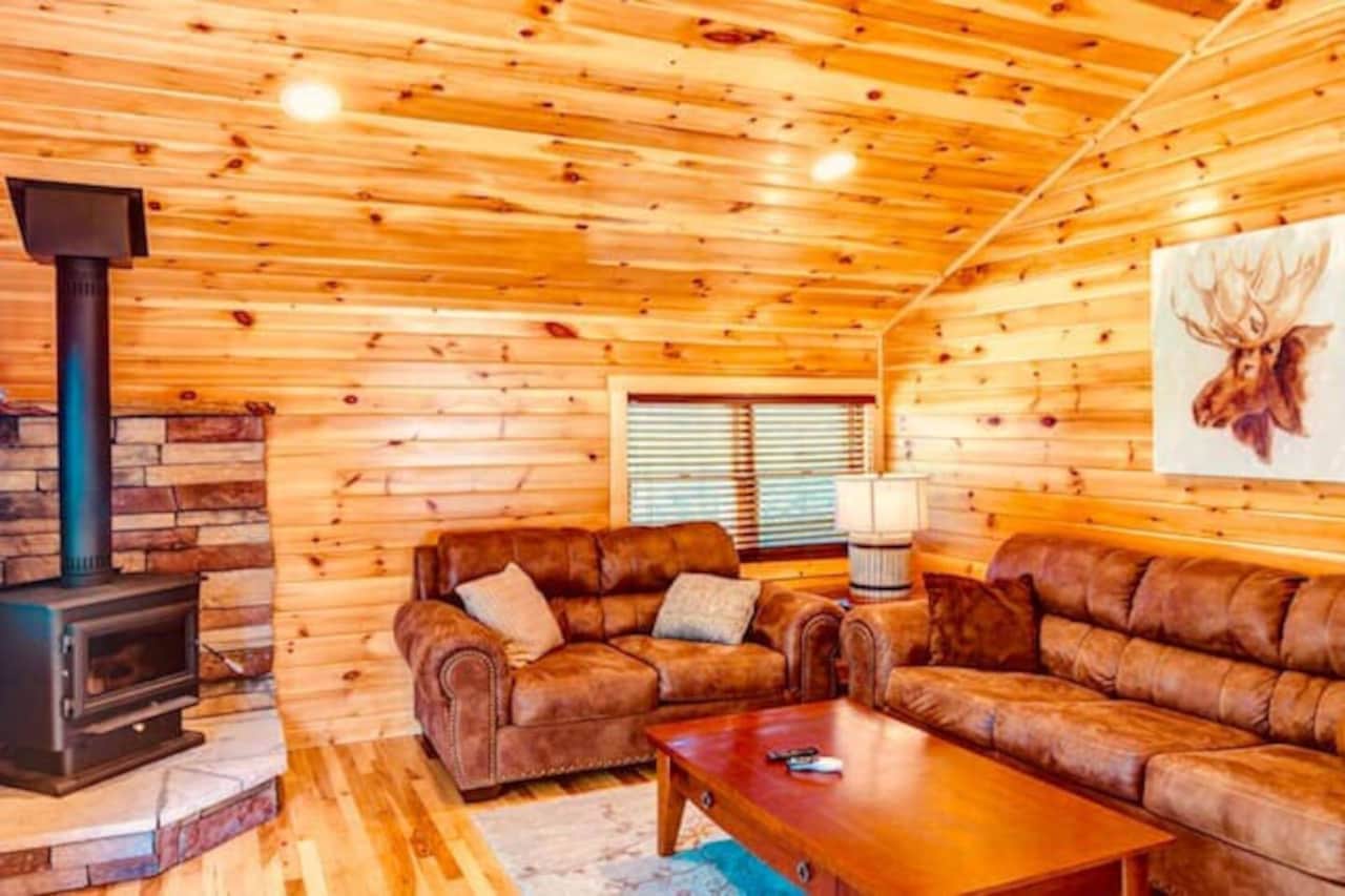 Living room with wood burning unit 