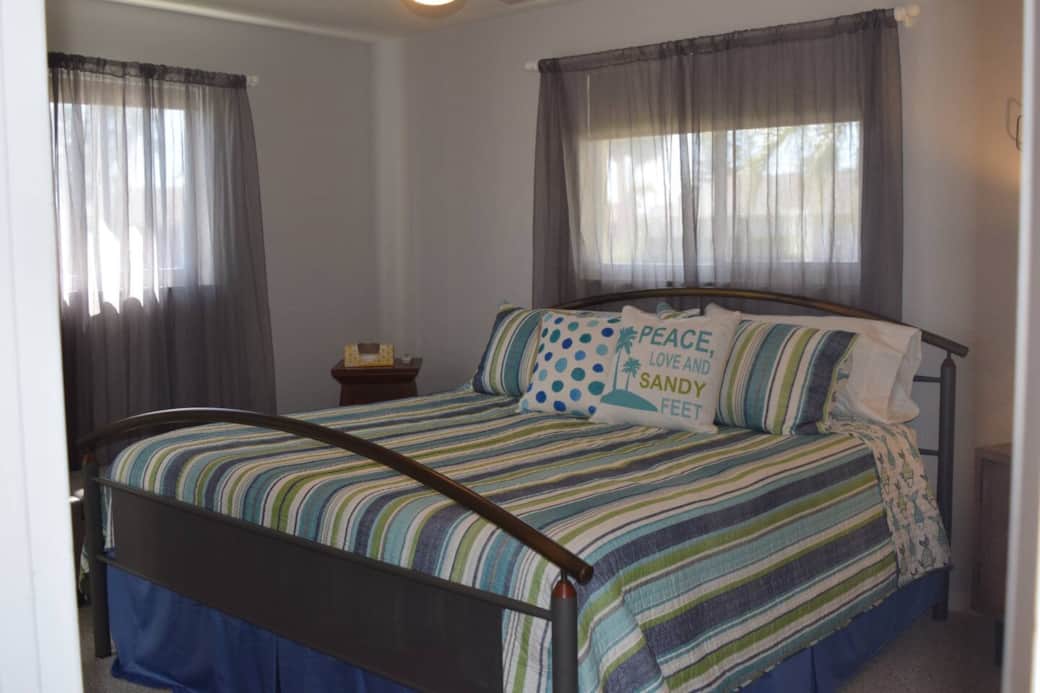 Master bedroom with king bed, closet with dresser and private bath. Master bedroom with king bed, closet with dresser and private bath.