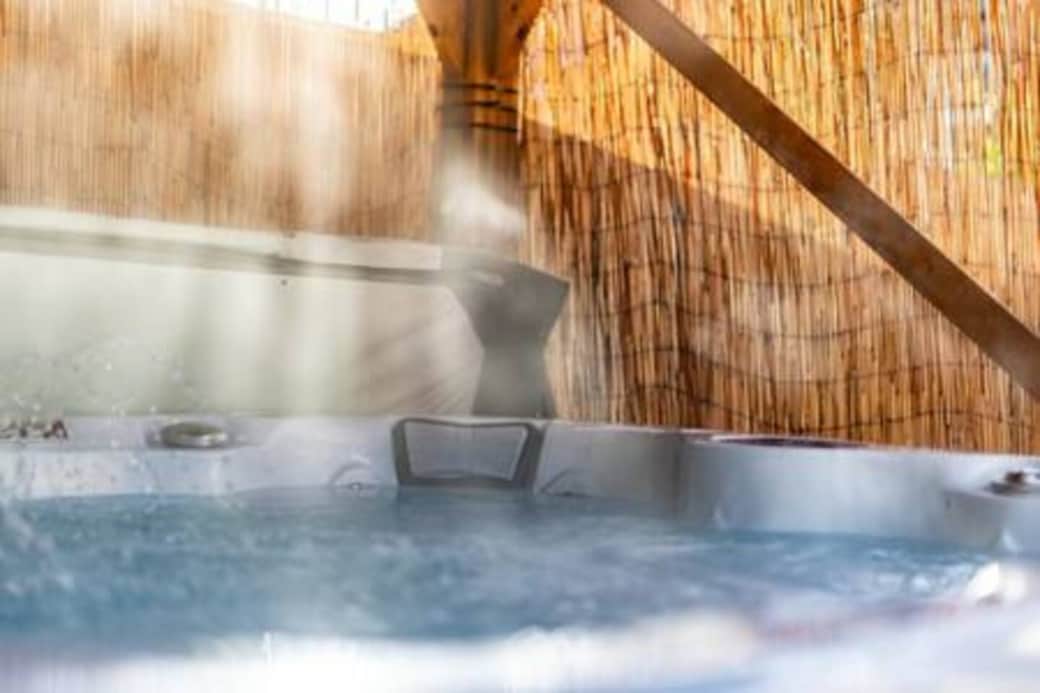 The Hot-tub is set to 37 degrees for your leisure. The Hot-tub is set to 37 degrees for your leisure.