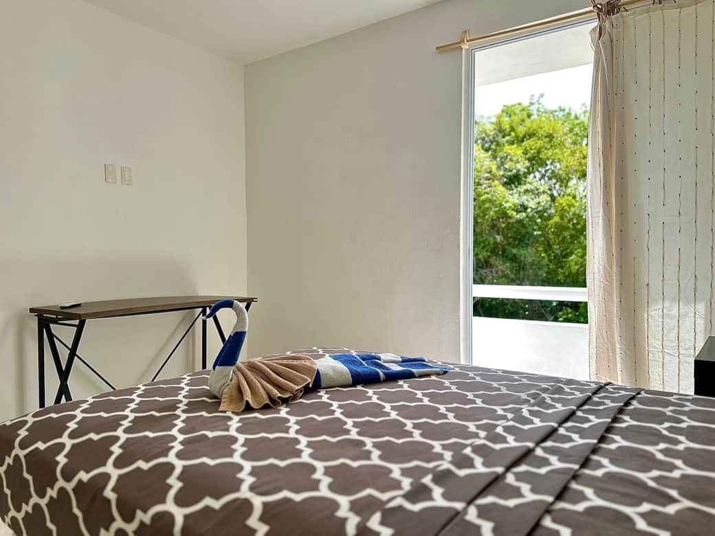 Bedroom with double size bed and en-suite bathroom and balcony