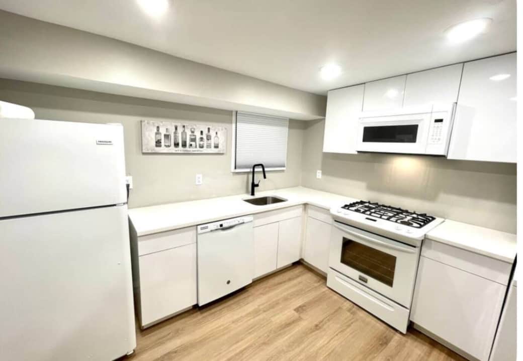 Full  Kitchen includes dishwasher, oven/stove, refrigerator, microwave, garbage disposal, dishes, and cookware, Keurig coffee maker.