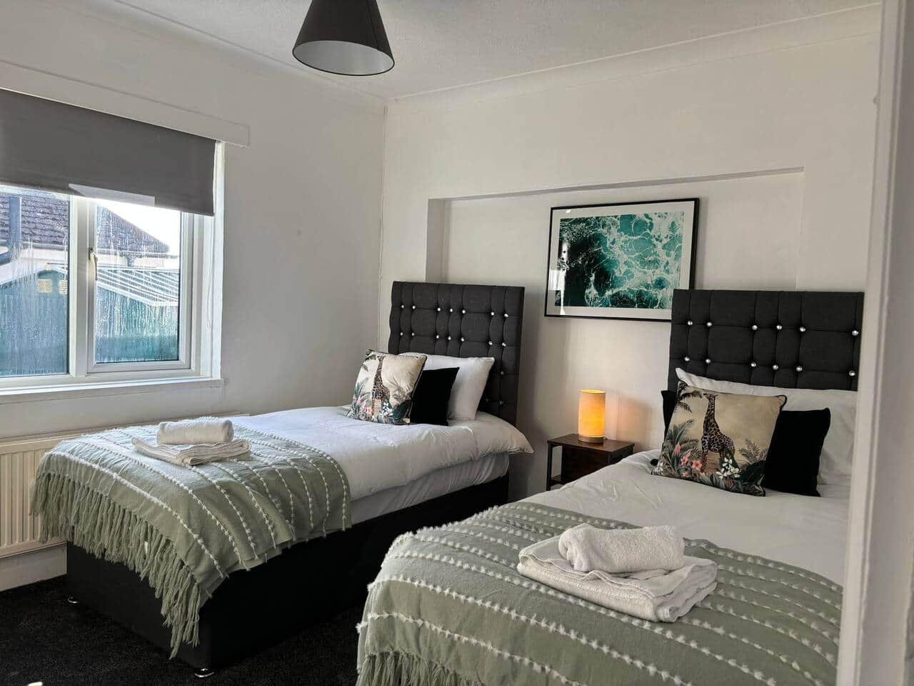 Unwind in our cozy and comfortable bedroom, perfect for a restful night's sleep. Book your stay now!