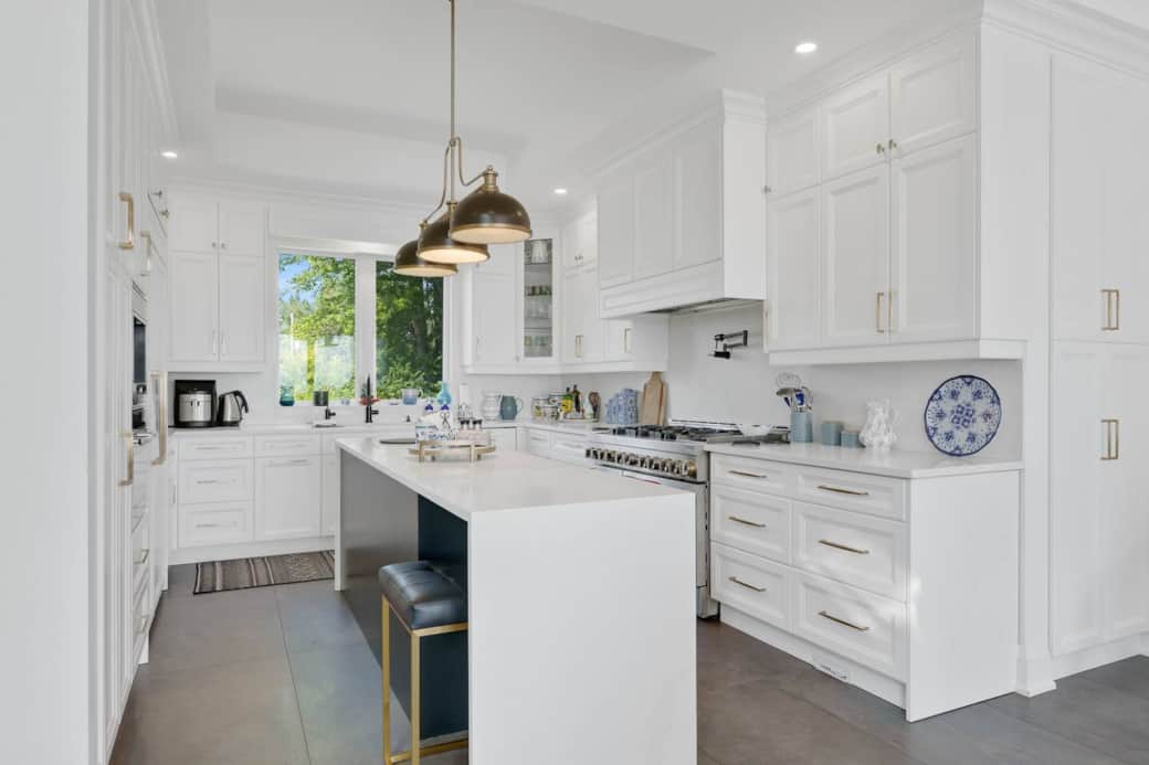 Chef's Kitchen with subzero wine fridge and breakfast bar.