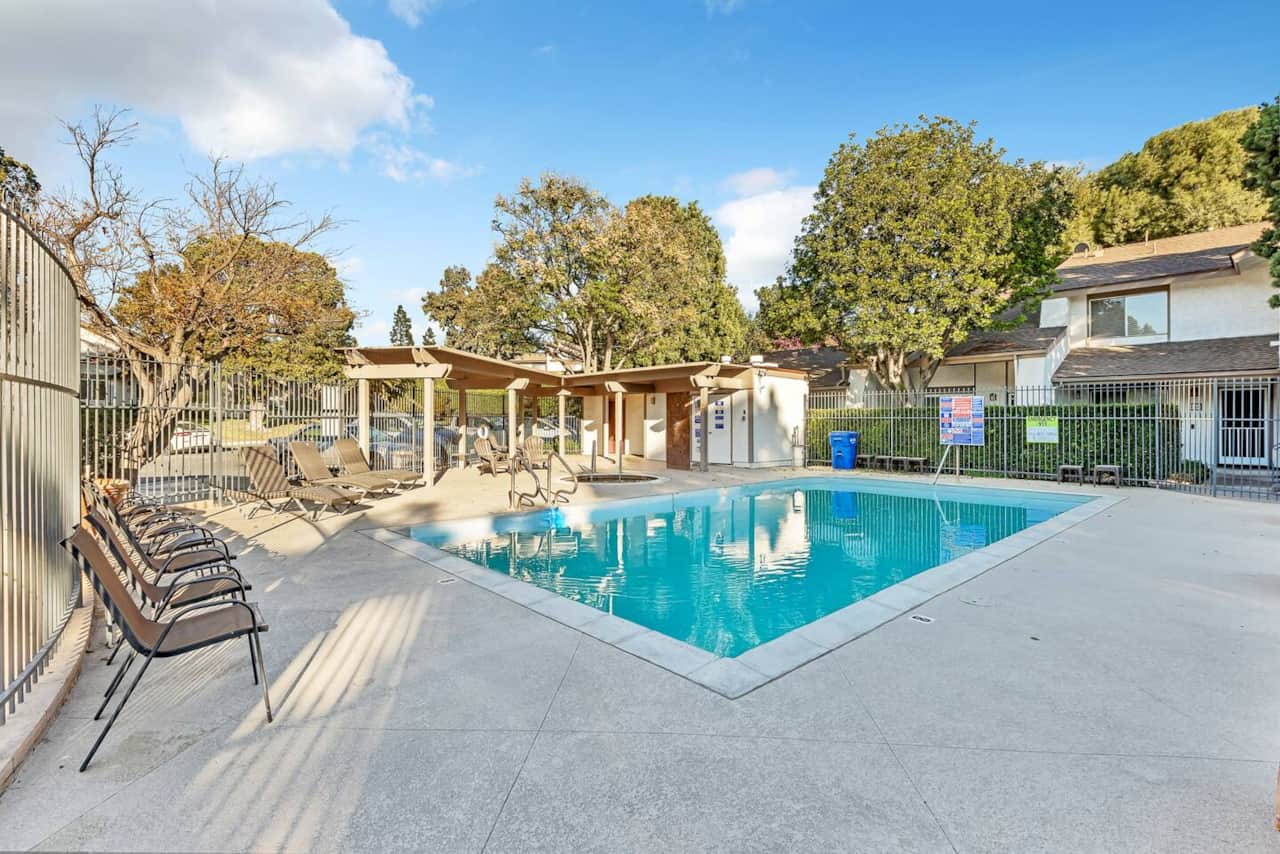 Unwind in style with poolside chairs that offer both comfort and a great view, making your stay even more relaxing.