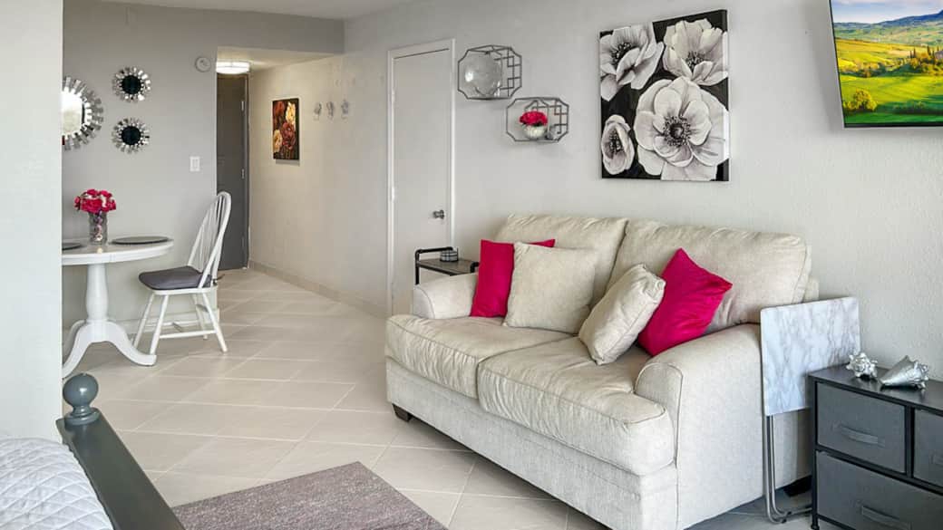 Loveseat, dining, entrance hall Loveseat, dining, entrance hall