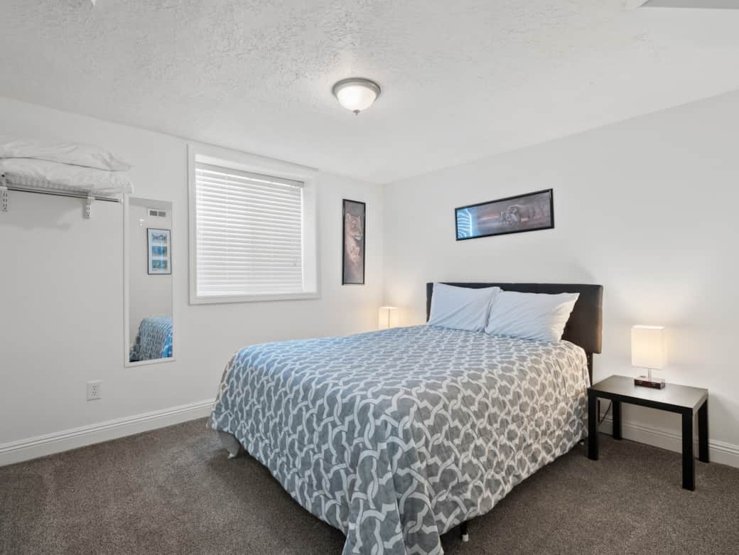 There are two single-queen beds downstairs.
