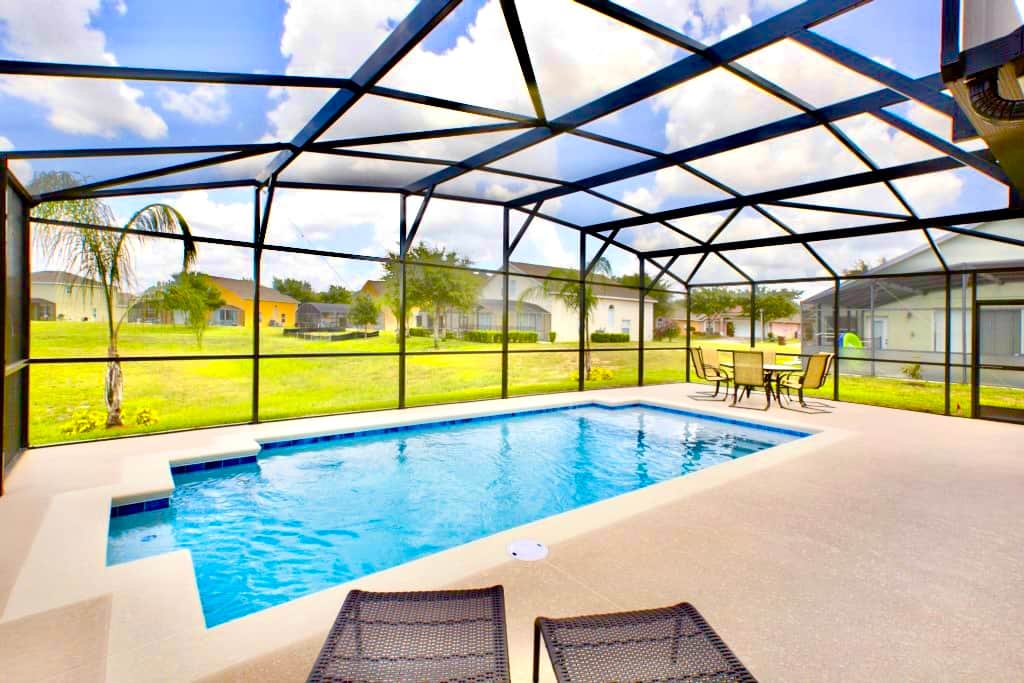 Private pool overlooking green space