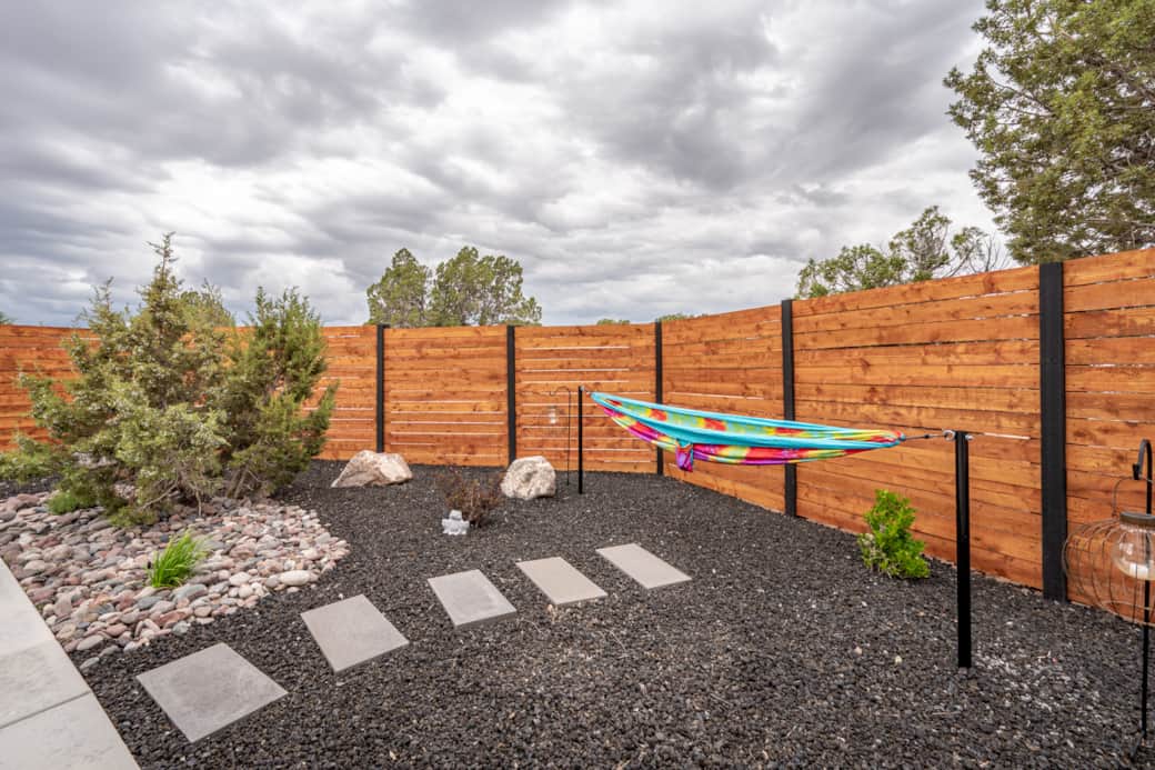 Enjoy a hammock, fire pit, and grill with 360° mountain and skyline views.