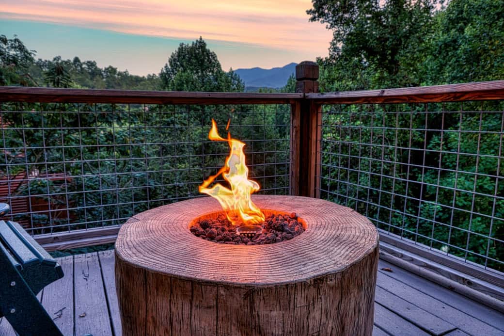 Main floor deck with view of Mt. LaConte, fire pit, gas grill and plenty of comfortable seating.