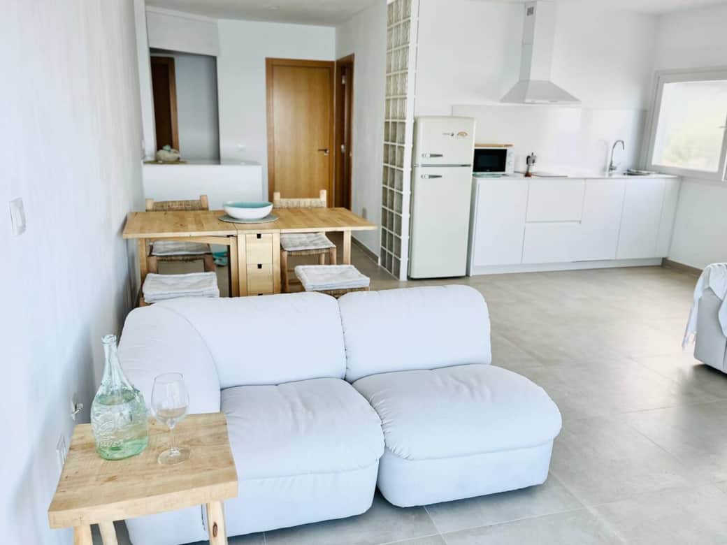 Bright, open-plan living area with integrated kitchen Bright, open-plan living area with integrated kitchen