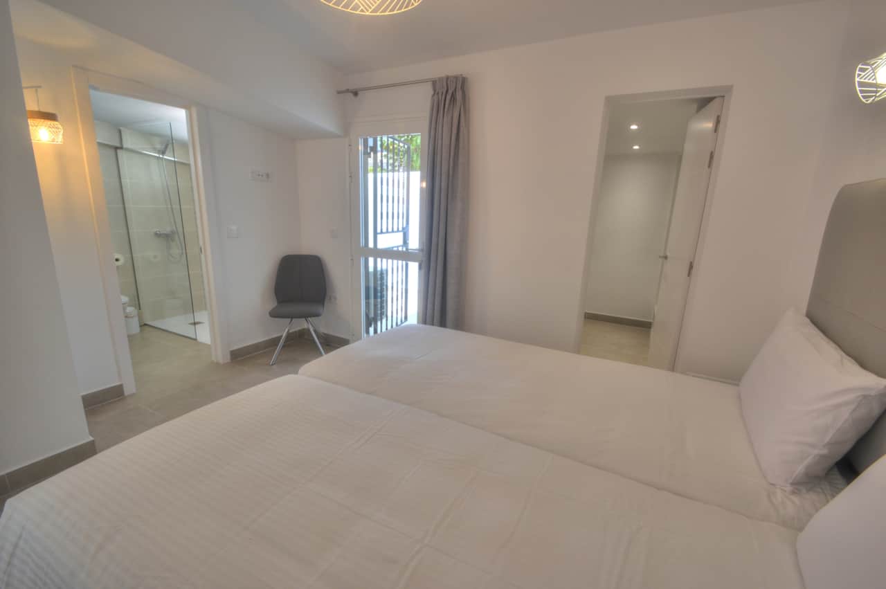 Bedroom 1 with 2 single beds