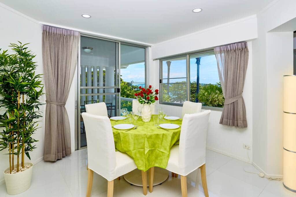 The dining table and the terrace with the outdoor dining table