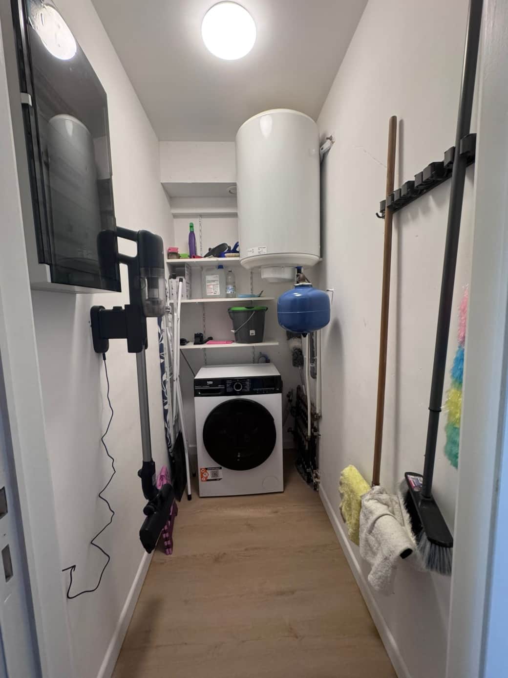 Berging met wasmachine was-droog combinatie