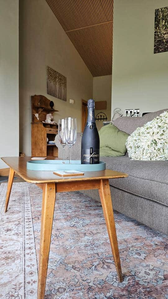 enjoy a nice bottle of bubbly on us