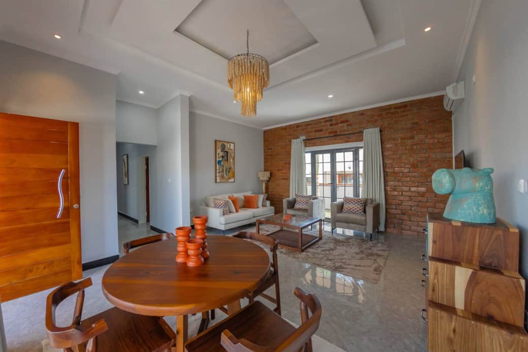 Comfortable living area with dining space and natural light