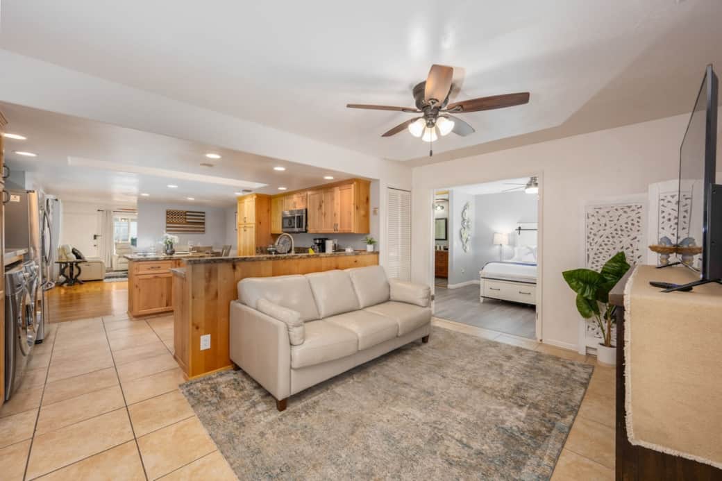 Our Rear living room is attached to Master bedroom and kitchen. It has a leather couch that easily converts into a queen size bed. Our Rear living room is attached to Master bedroom and kitchen. It has a leather couch that easily converts into a queen size bed.