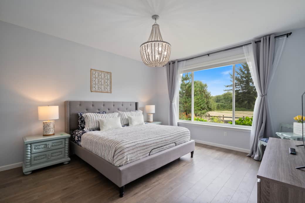 Bright and airy master bedroom with a king-sized bed, perfect for restful nights and lazy mornings.