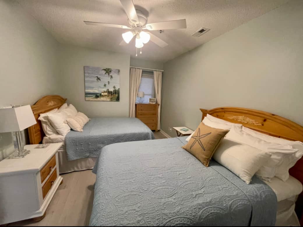 Second Bedroom w/ 2 full beds (new mattresses) and connecting bathroom Second Bedroom w/ 2 full beds (new mattresses) and connecting bathroom