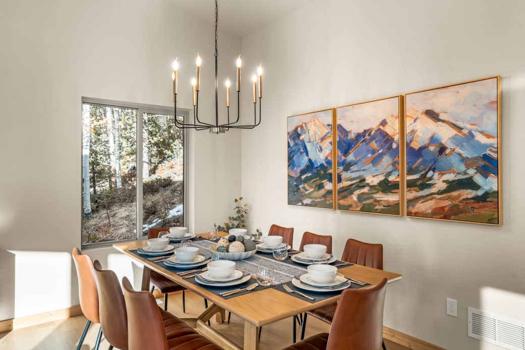 The stylish dining area seats up to 8 guests. The stylish dining area seats up to 8 guests.