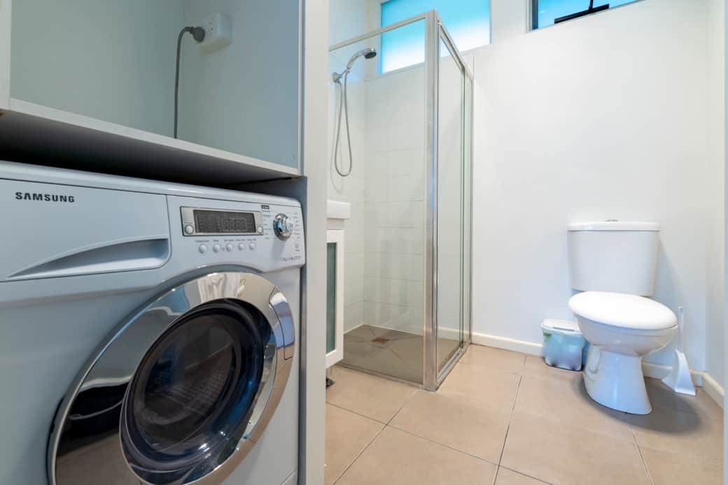 Studio Apartment Laundry and Bathroom 01