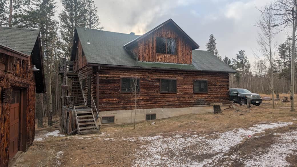 Stairs to The Loft on East side of house