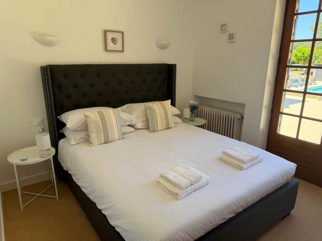 Elegant bedroom with countryside views near Monpazier